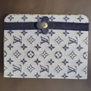 Louis Vuitton Used Mini Notebook with Flower Emblem Strap Closure